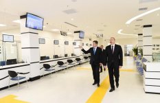 Azerbaijani president inaugurates new residence of real estate services (PHOTO)