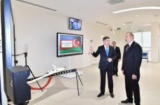 Azerbaijani president inaugurates new residence of real estate services (PHOTO)