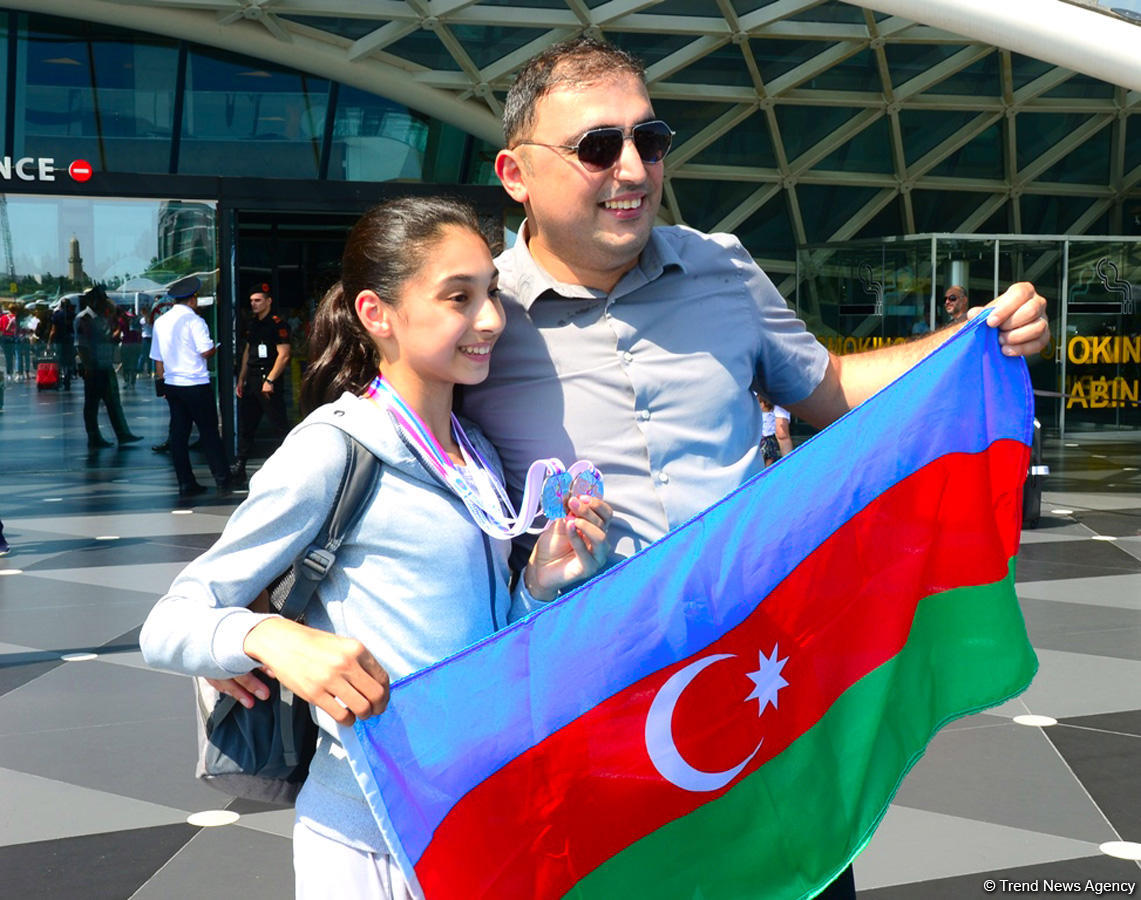 Victorious Azerbaijani gymnast returns home from FIG Championships in Moscow (PHOTO)