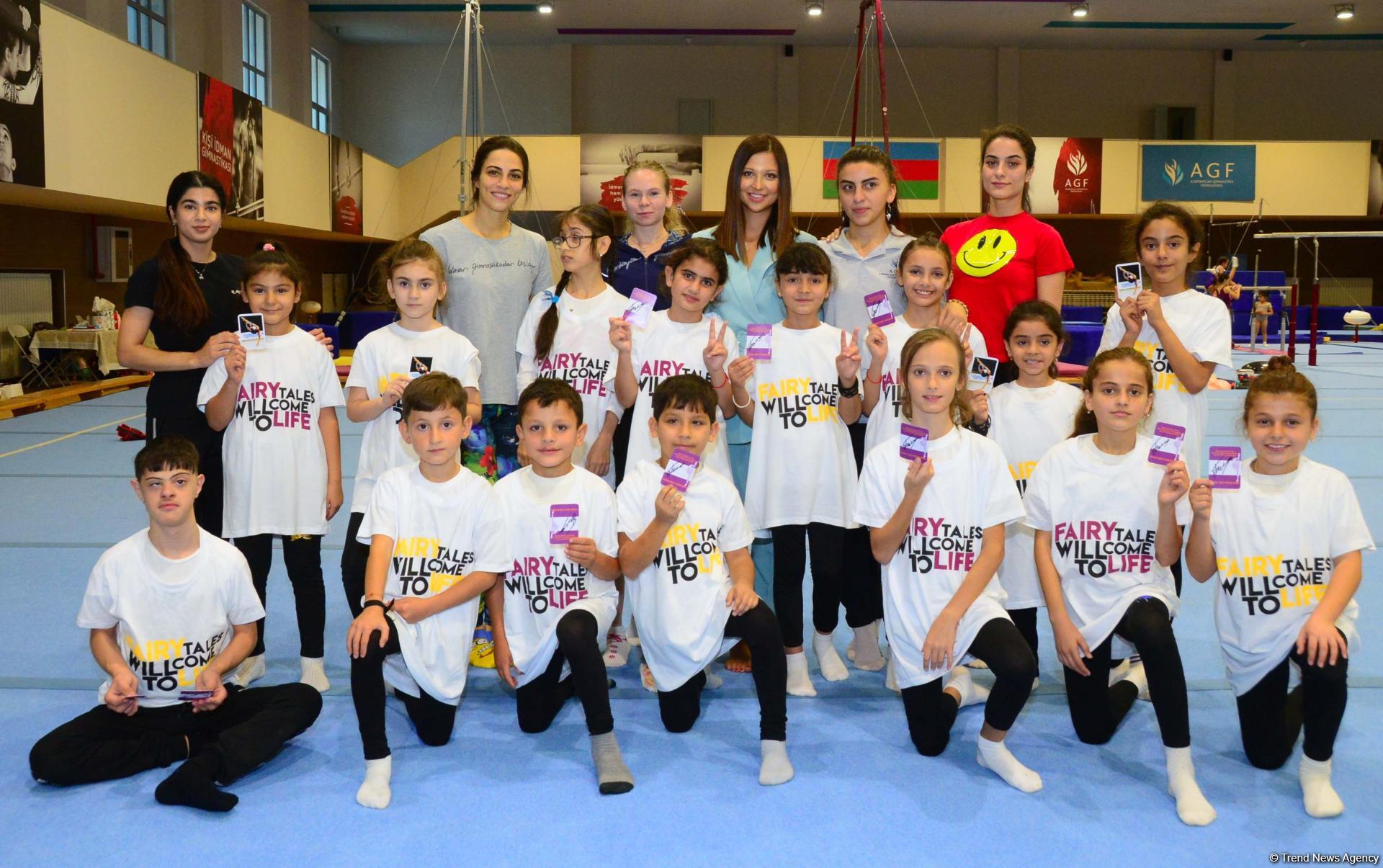 World champion gymnast meets children with disabilities in Baku (PHOTO)