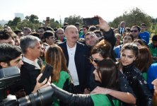 Azerbaijani president, first lady attend tree-planting campaign in Khatai district, Baku (PHOTO)