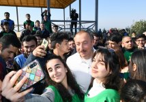 Azerbaijani president, first lady attend tree-planting campaign in Khatai district, Baku (PHOTO)