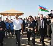 Azerbaijani president, first lady attend tree-planting campaign in Khatai district, Baku (PHOTO)