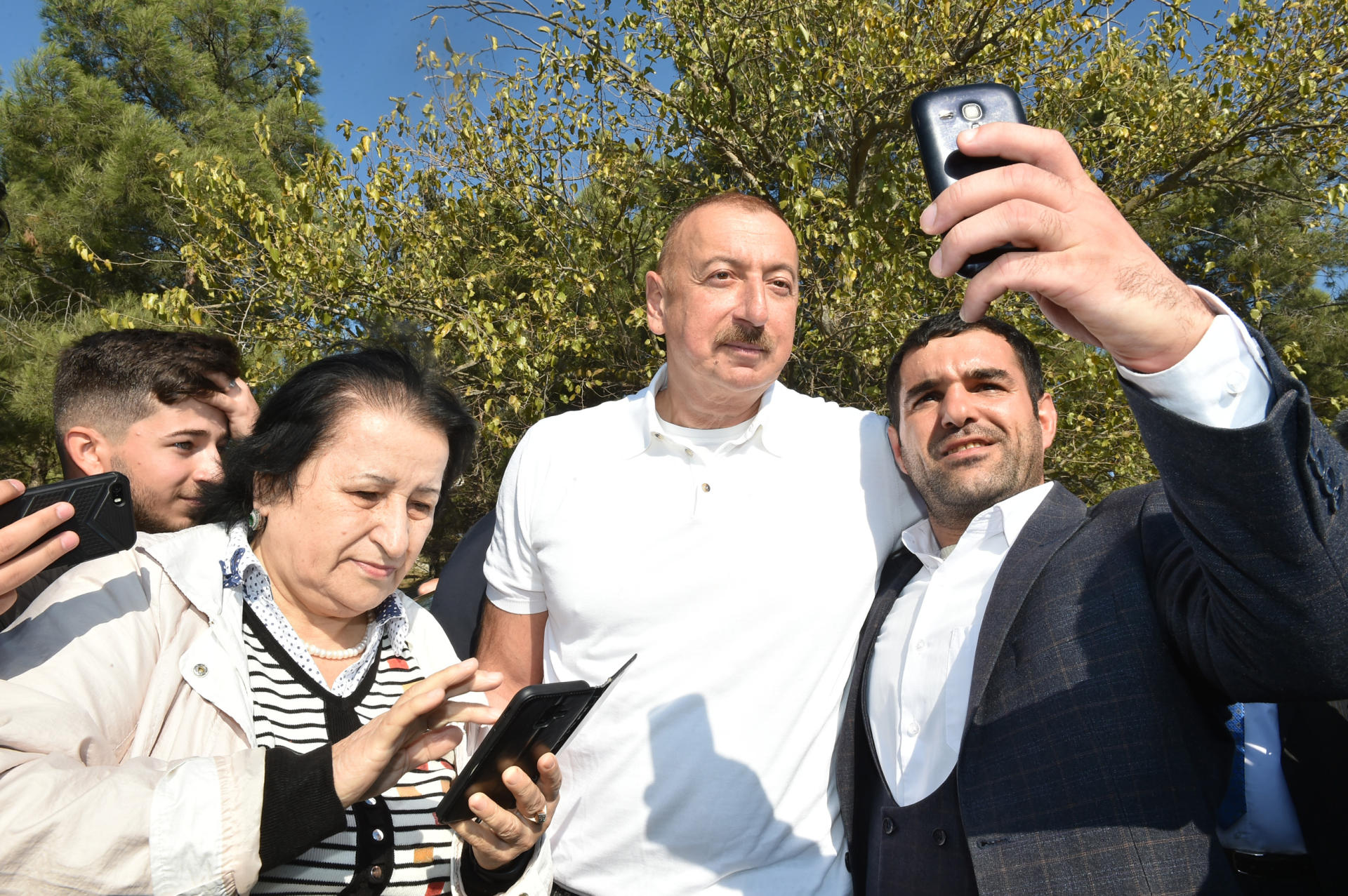 Azerbaijani president, first lady attend tree-planting campaign in Khatai district, Baku (PHOTO)