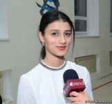 Members of Azerbaijan's national rhythmic gymnastics team meet with young athletes (PHOTO)