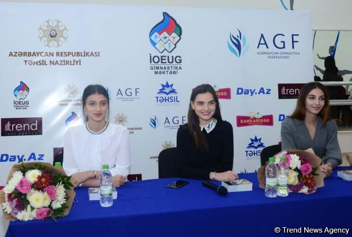 Members of Azerbaijan's national rhythmic gymnastics team meet with young athletes (PHOTO)
