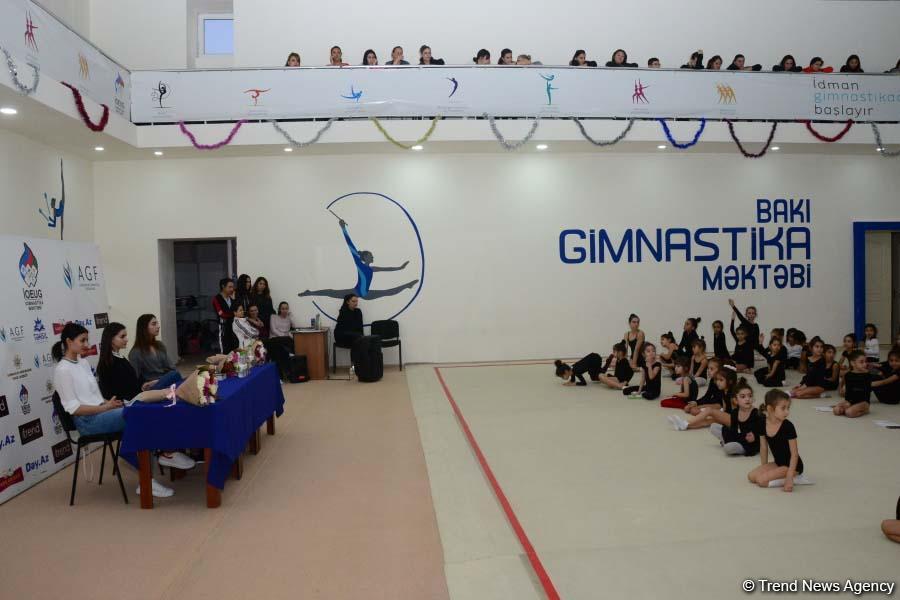Members of Azerbaijan's national rhythmic gymnastics team meet with young athletes (PHOTO)