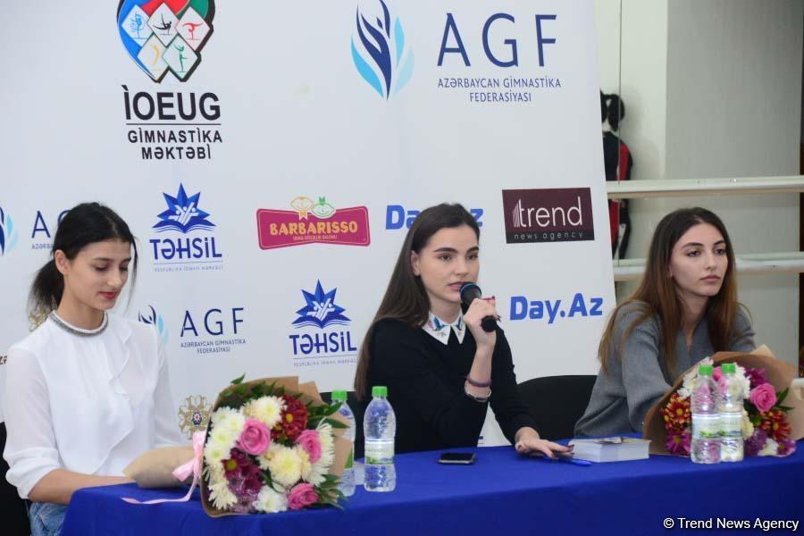 Members of Azerbaijan's national rhythmic gymnastics team meet with young athletes (PHOTO)