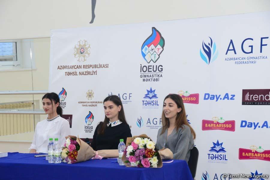 Members of Azerbaijan's national rhythmic gymnastics team meet with young athletes (PHOTO)