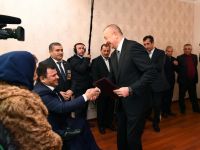 President Aliyev attends ceremony held to give out apartments to Karabakh war vets (PHOTO)