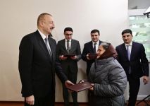 President Aliyev attends ceremony held to give out apartments to Karabakh war vets (PHOTO)