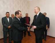 President Aliyev attends ceremony held to give out apartments to Karabakh war vets (PHOTO)