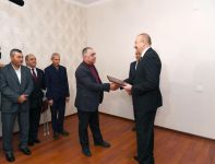 President Aliyev attends ceremony held to give out apartments to Karabakh war vets (PHOTO)