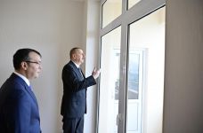 President Aliyev attends ceremony held to give out apartments to Karabakh war vets (PHOTO)