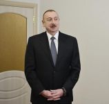 President Aliyev attends ceremony held to give out apartments to Karabakh war vets (PHOTO)