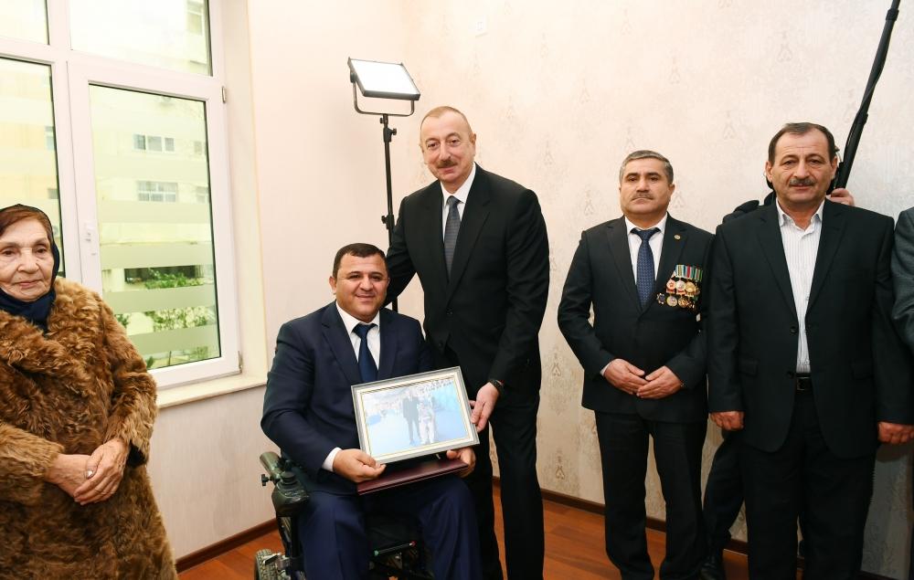 President Aliyev attends ceremony held to give out apartments to Karabakh war vets (PHOTO)