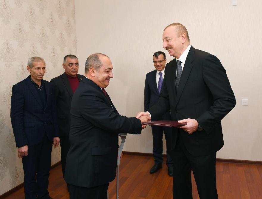 President Aliyev attends ceremony held to give out apartments to Karabakh war vets (PHOTO)