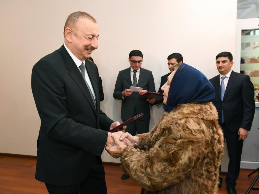 President Aliyev attends ceremony held to give out apartments to Karabakh war vets (PHOTO)