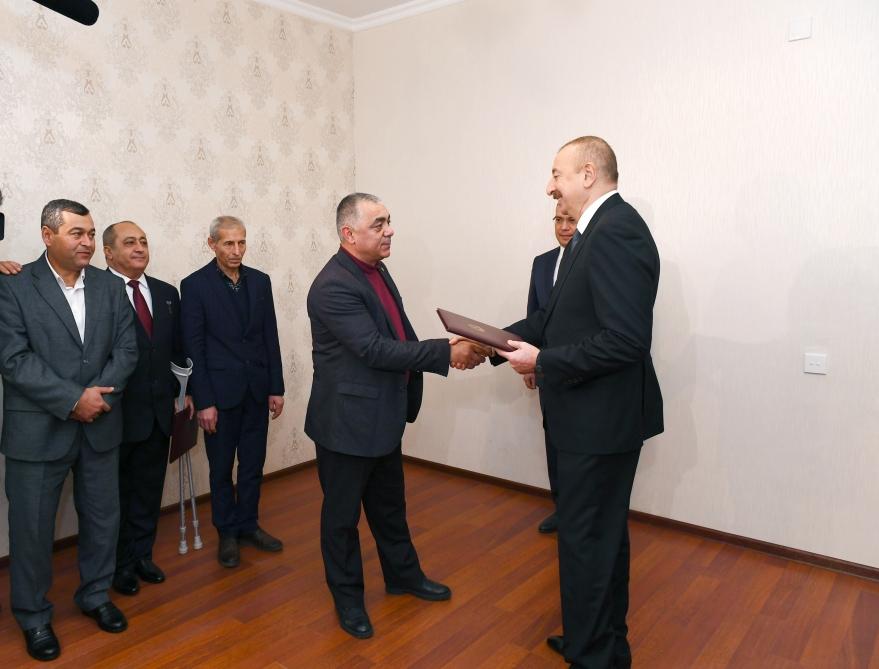 President Aliyev attends ceremony held to give out apartments to Karabakh war vets (PHOTO)