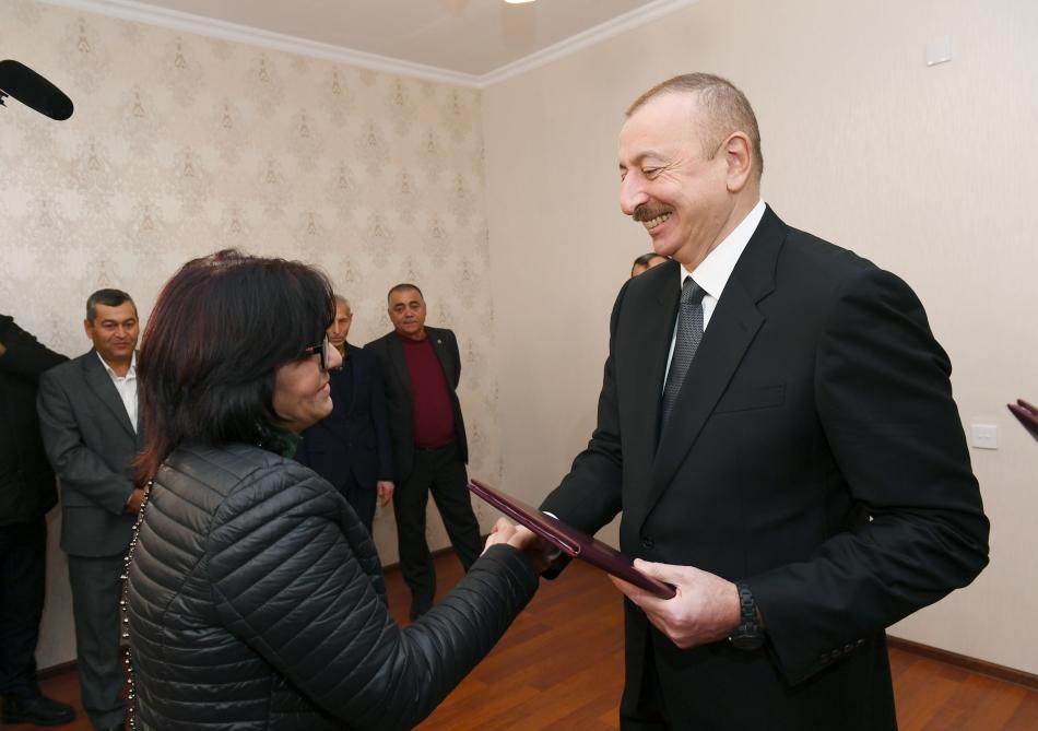 President Aliyev attends ceremony held to give out apartments to Karabakh war vets (PHOTO)