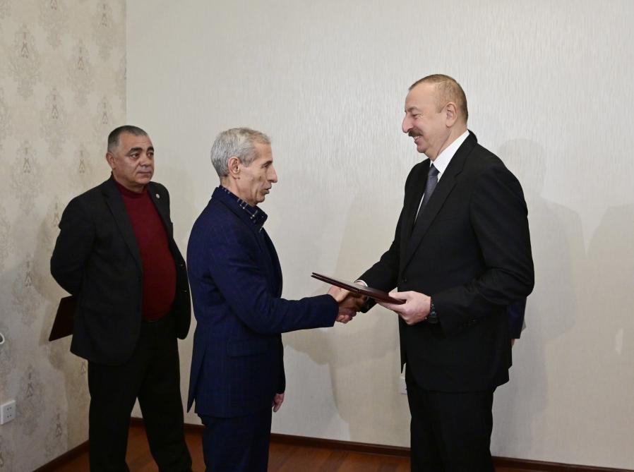 President Aliyev attends ceremony held to give out apartments to Karabakh war vets (PHOTO)