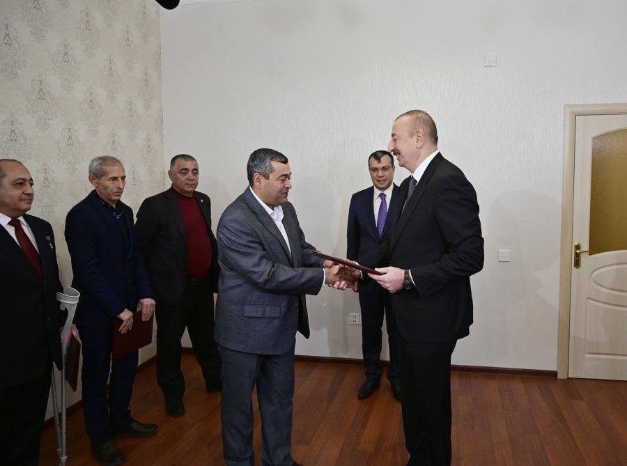 President Aliyev attends ceremony held to give out apartments to Karabakh war vets (PHOTO)