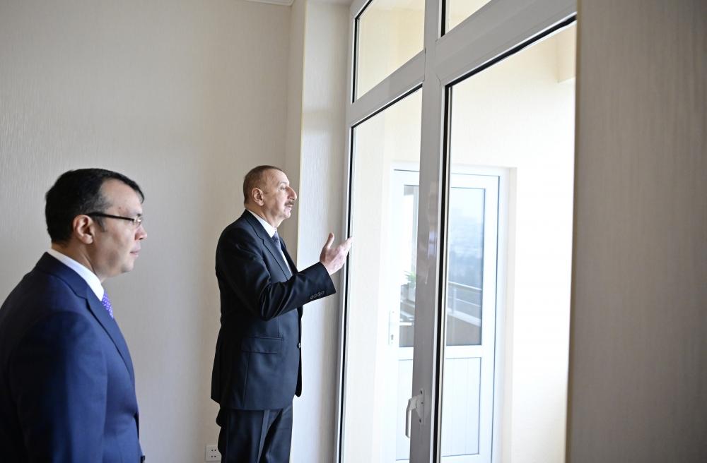 President Aliyev attends ceremony held to give out apartments to Karabakh war vets (PHOTO)