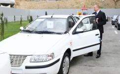 Azerbaijani president, first lady attend ceremony to give out apartments, cars to martyr families, war disabled in Baku (PHOTO/VIDEO)