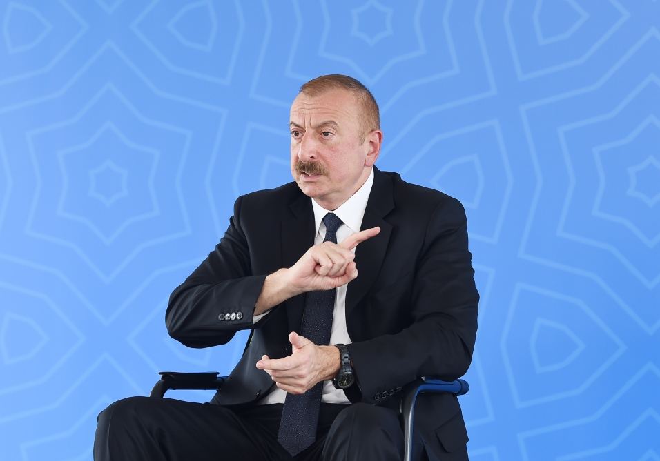 Azerbaijani president, first lady attend ceremony to give out apartments, cars to martyr families, war disabled in Baku (PHOTO/VIDEO)