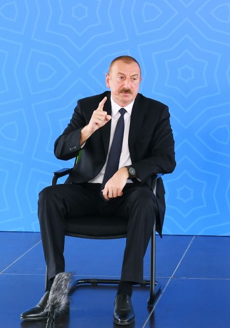 Azerbaijani president, first lady attend ceremony to give out apartments, cars to martyr families, war disabled in Baku (PHOTO/VIDEO)