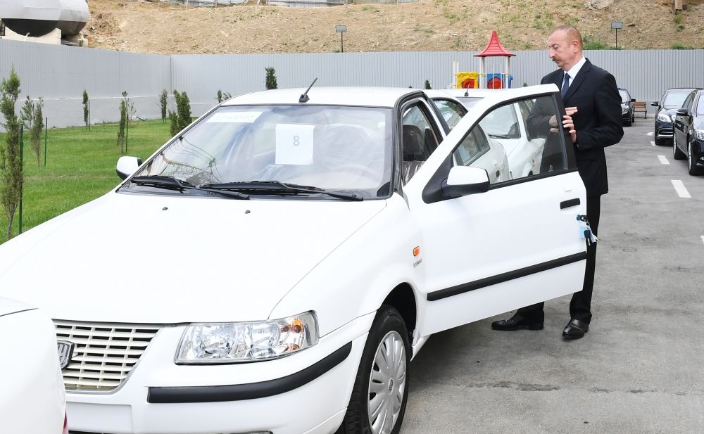 Azerbaijani president, first lady attend ceremony to give out apartments, cars to martyr families, war disabled in Baku (PHOTO/VIDEO)