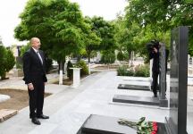 Azerbaijani president visits graves of martyrs of Patriotic War at Nakhchivan city cemetery (PHOTO)