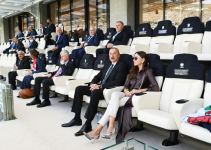 Azerbaijani president, first lady watch football match between Switzerland and Wales (PHOTO)