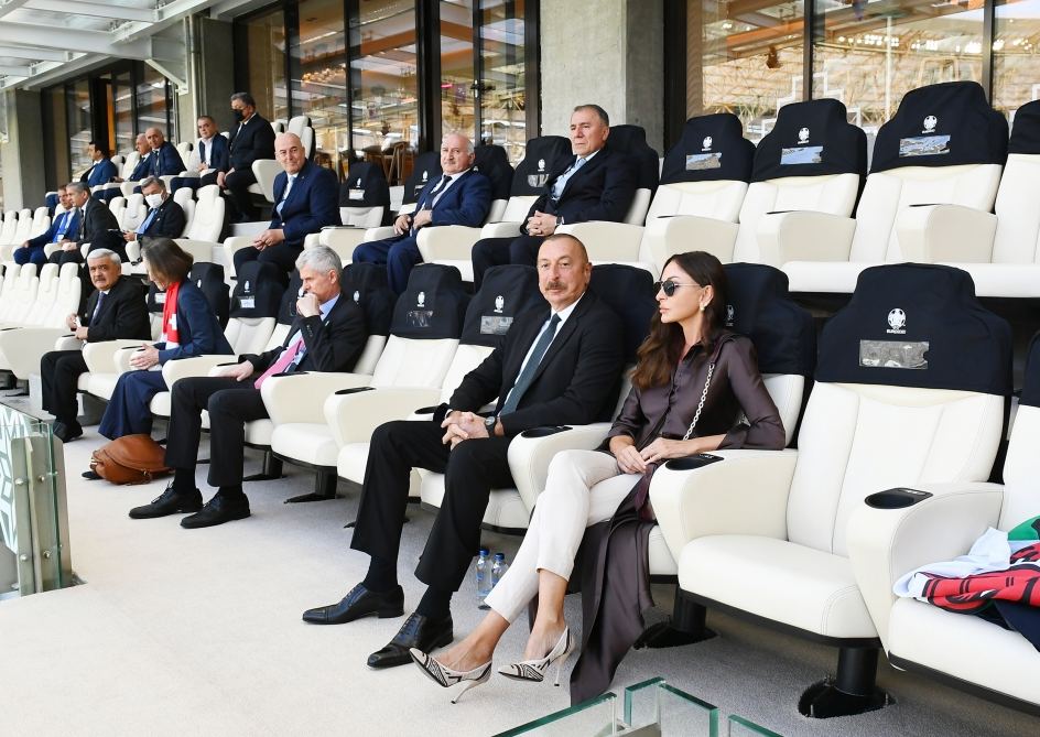 Azerbaijani president, first lady watch football match between Switzerland and Wales (PHOTO)