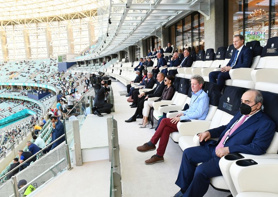 Azerbaijani president, first lady watch football match between Switzerland and Wales (PHOTO)