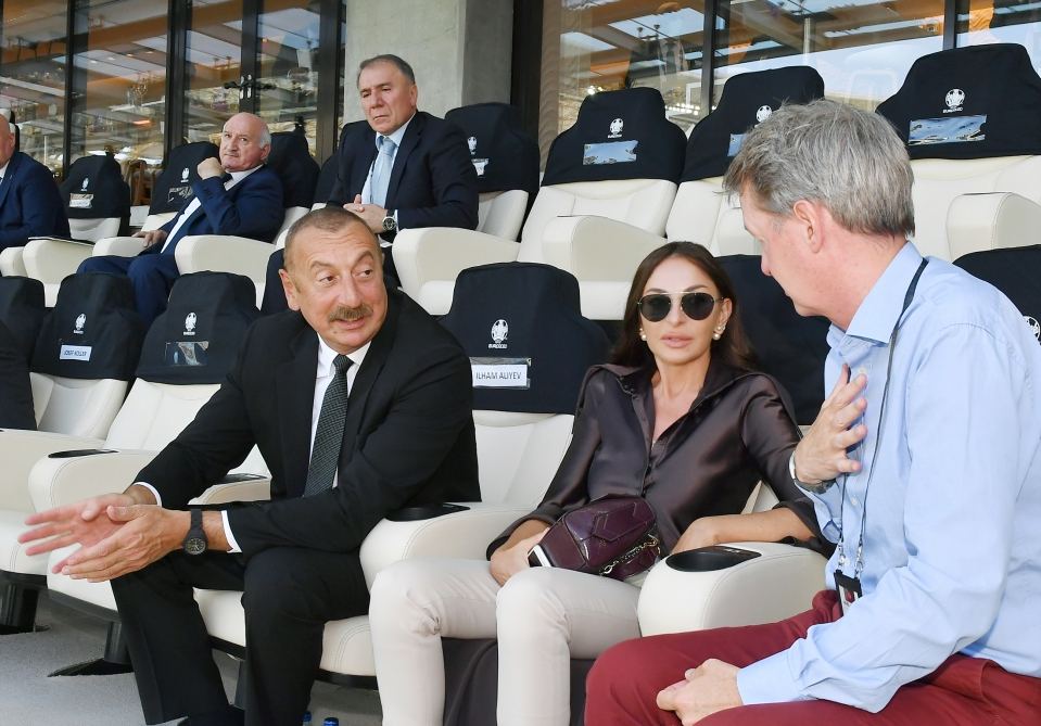 Azerbaijani president, first lady watch football match between Switzerland and Wales (PHOTO)