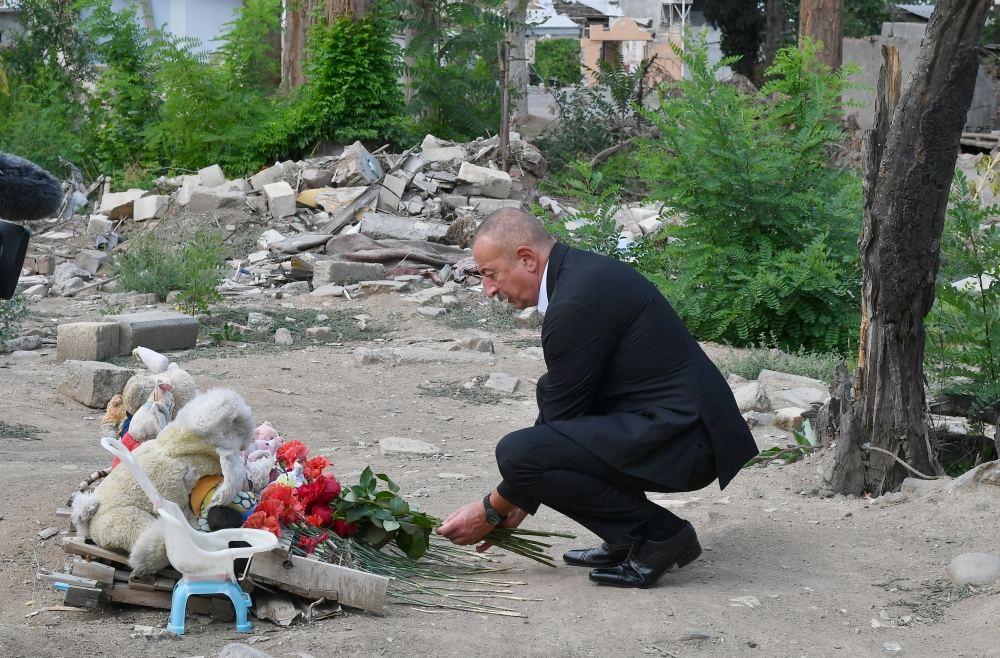 Azerbaijani president views consequences of Armenia's missile attacks in Ganja (PHOTO)