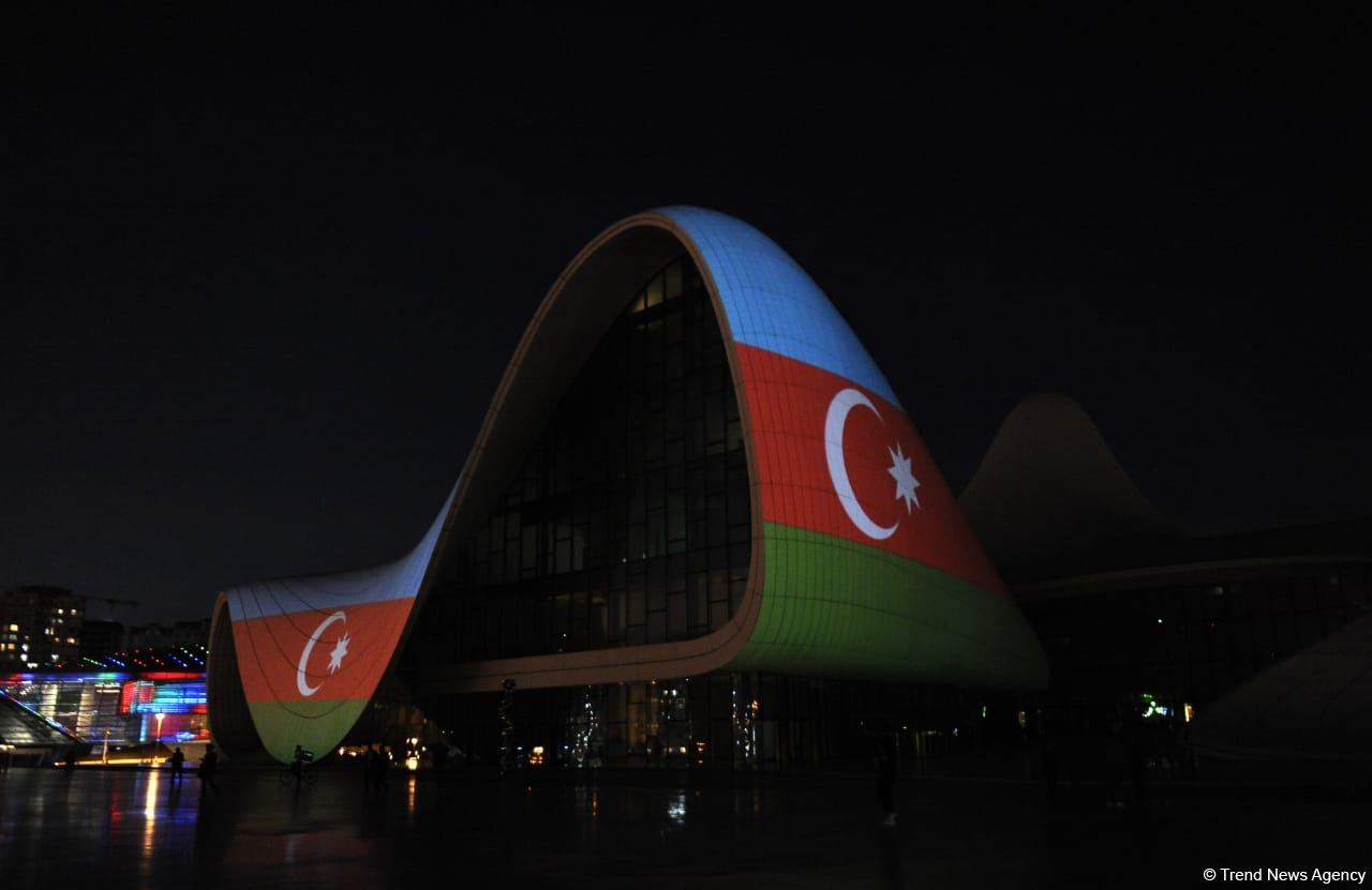 Heydar Aliyev Center in Baku illuminated with colors of National Flag of Azerbaijan (PHOTO)