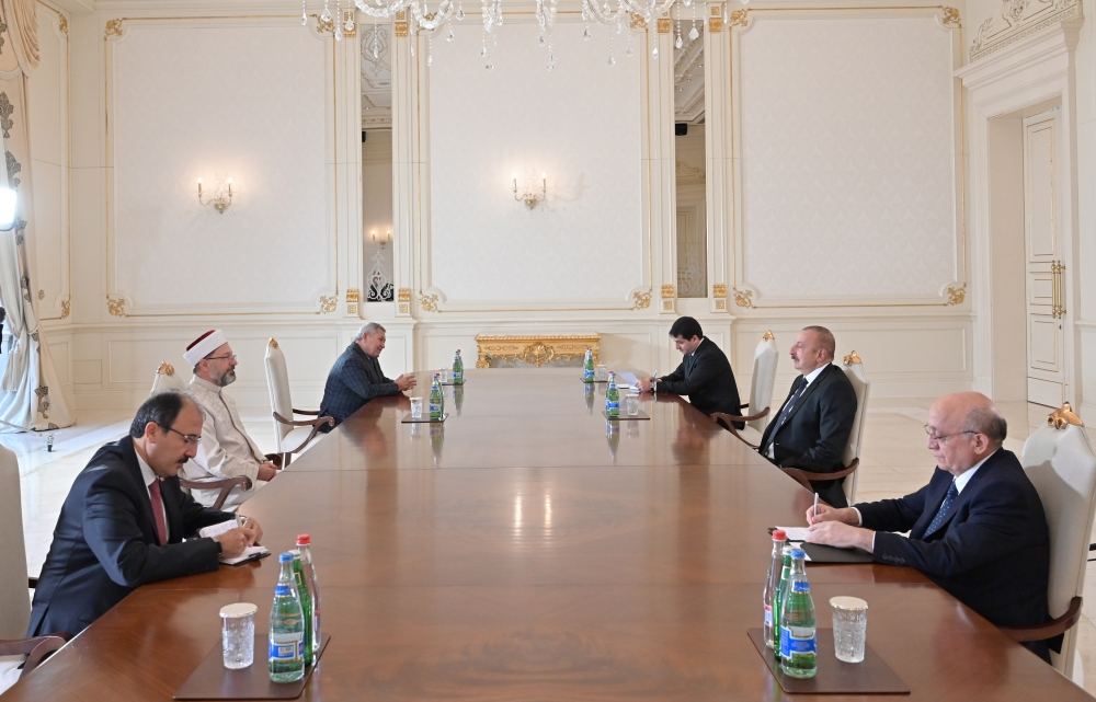 President Ilham Aliyev receives president of Turkey's religious affairs (PHOTO/VIDEO)