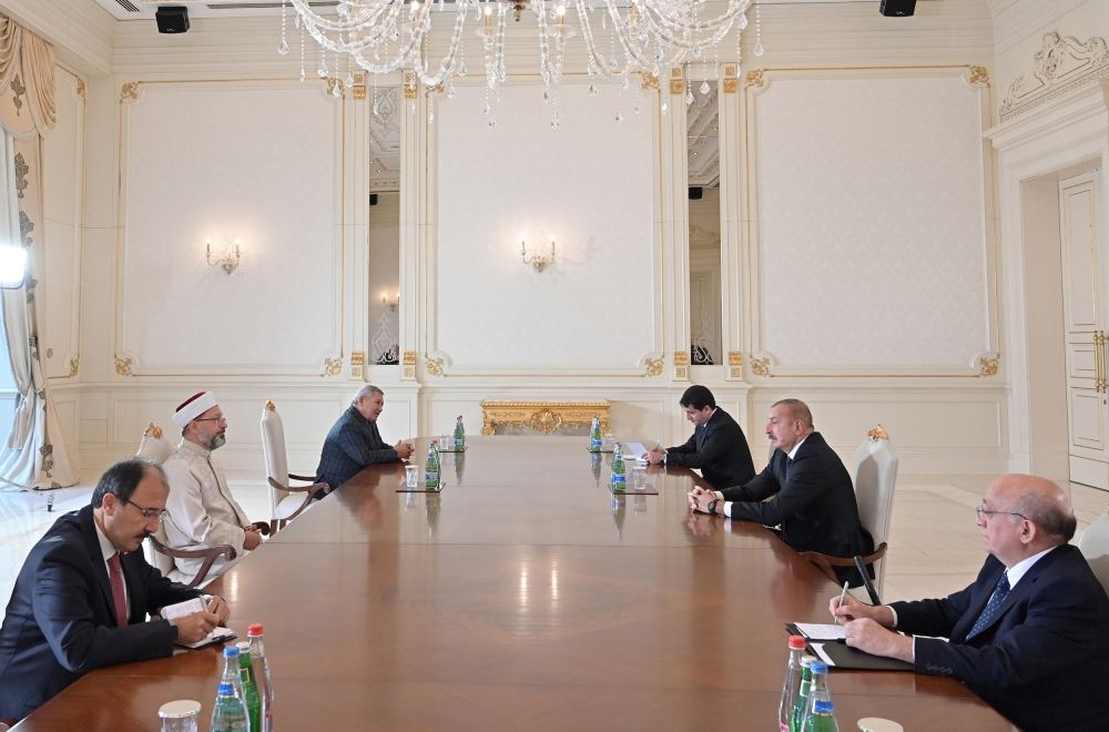 President Ilham Aliyev receives president of Turkey's religious affairs (PHOTO/VIDEO)