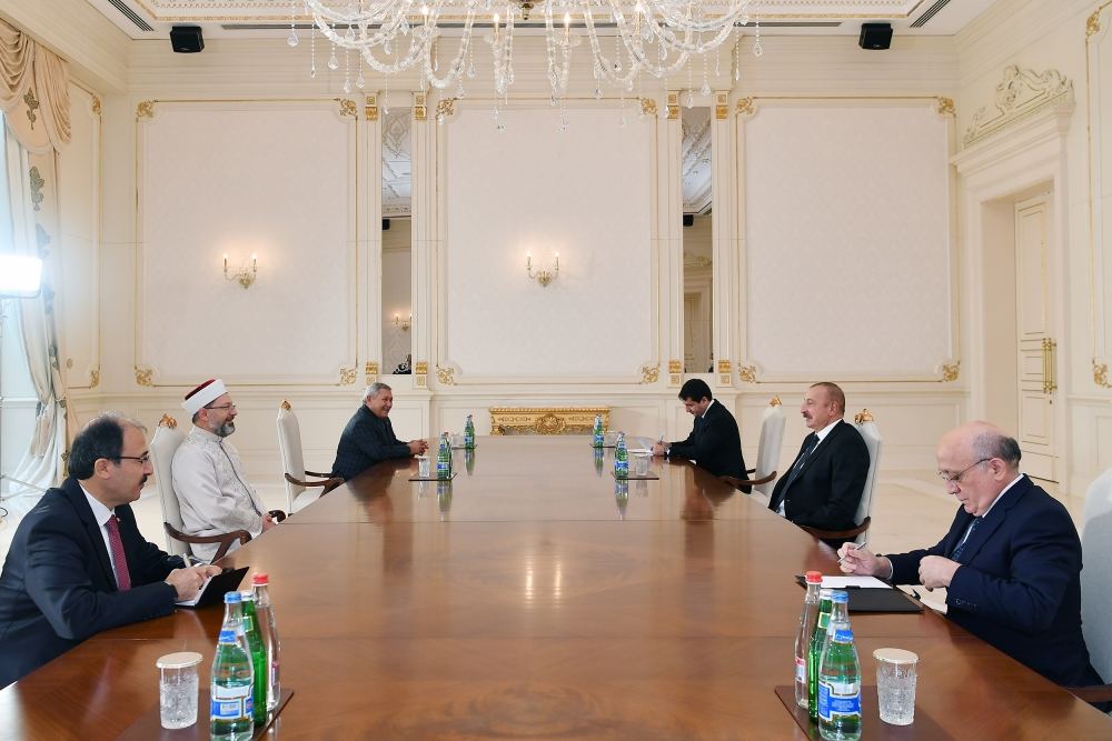 President Ilham Aliyev receives president of Turkey's religious affairs (PHOTO/VIDEO)