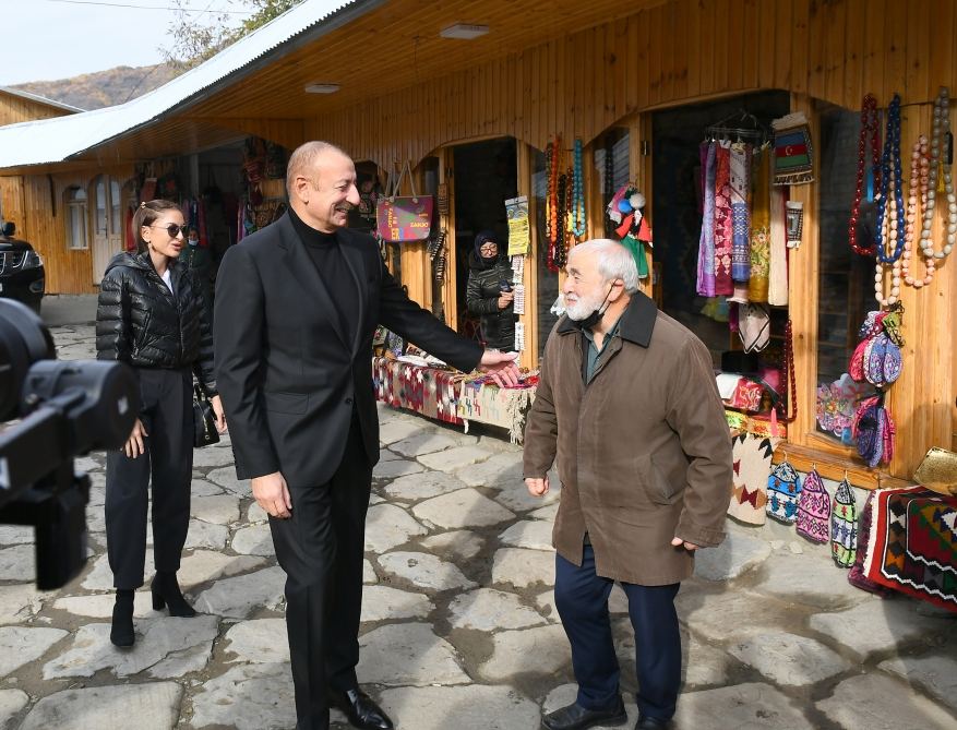 President Ilham Aliyev and First Lady Mehriban Aliyeva talk to residents of Lahij settlement (VIDEO)