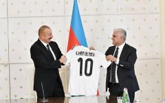 Uniform of Qarabag football club and ball with autographs of players presented to President Ilham Aliyev (PHOTO)