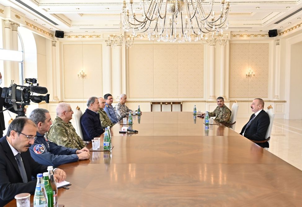President Ilham Aliyev receives delegation led by Turkish National Defense Minister (PHOTO/VIDEO)