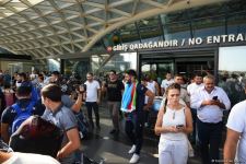 Azerbaijani participants of V Islamic Solidarity Games return home (PHOTO/VIDEO)