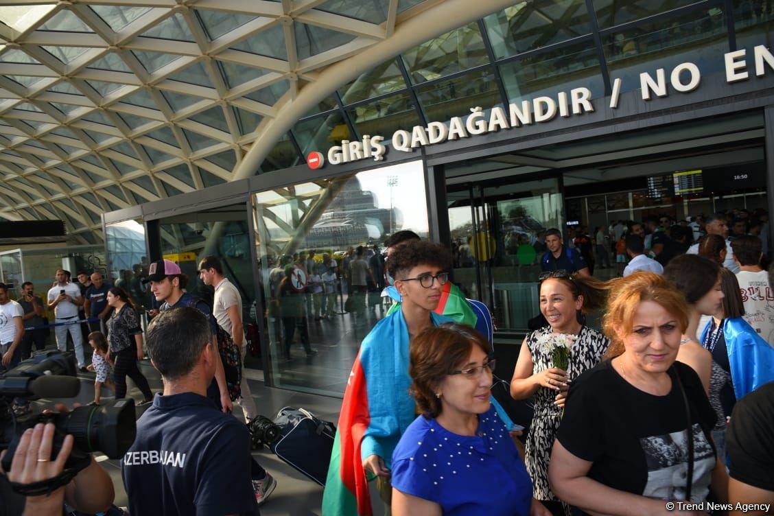 Azerbaijani participants of V Islamic Solidarity Games return home (PHOTO/VIDEO)