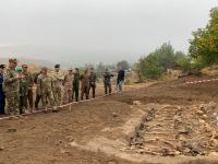 Military attachés accredited to Azerbaijan examine mass burial site found in Edilli village (PHOTO)