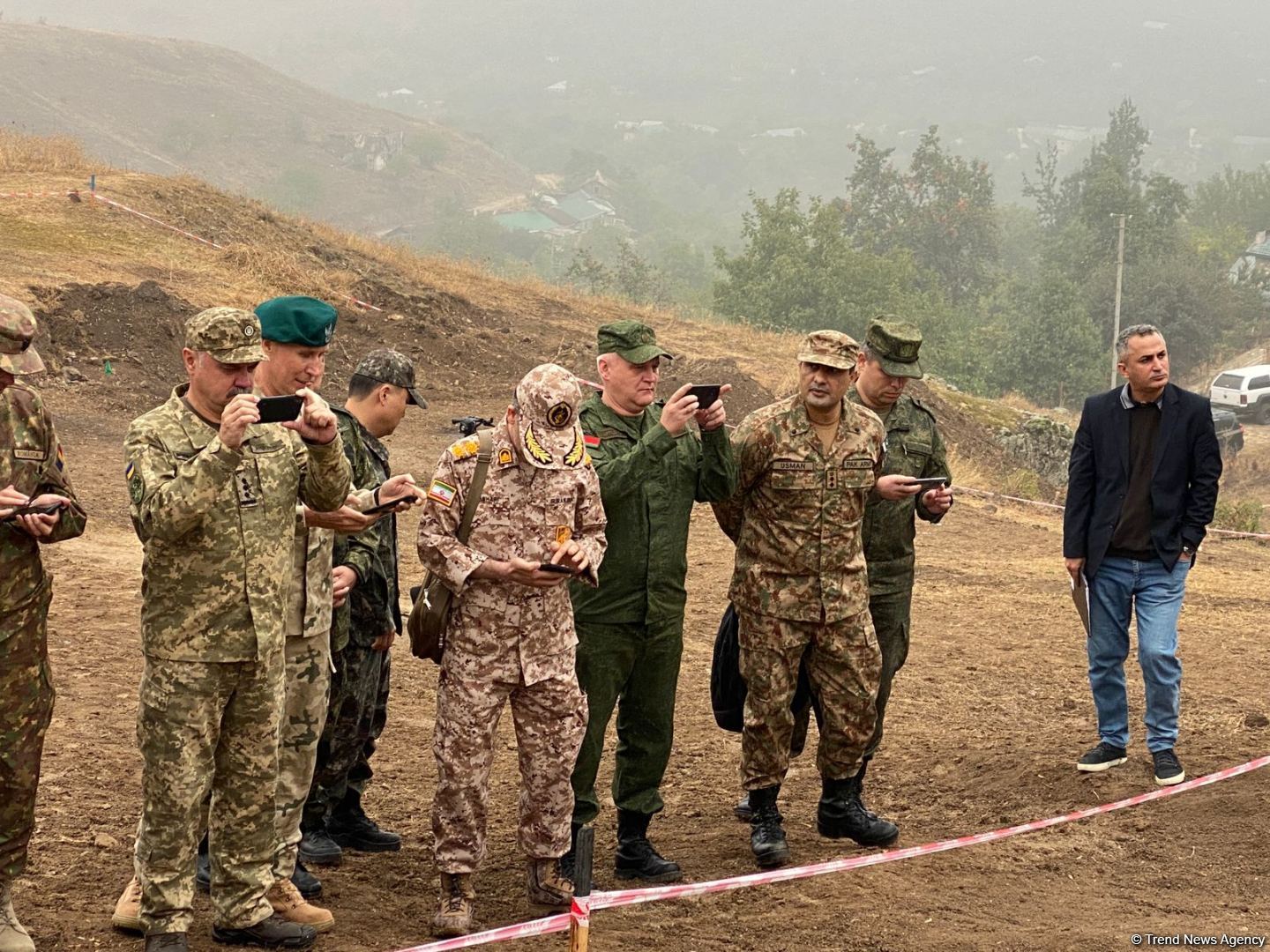 Military attachés accredited to Azerbaijan examine mass burial site found in Edilli village (PHOTO)