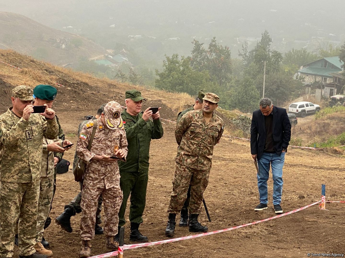 Military attachés accredited to Azerbaijan examine mass burial site found in Edilli village (PHOTO)