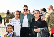 President Ilham Aliyev and First Lady Mehriban Aliyeva talk to residents of Aghali village, inquire about their conditions (PHOTO/VIDEO)
